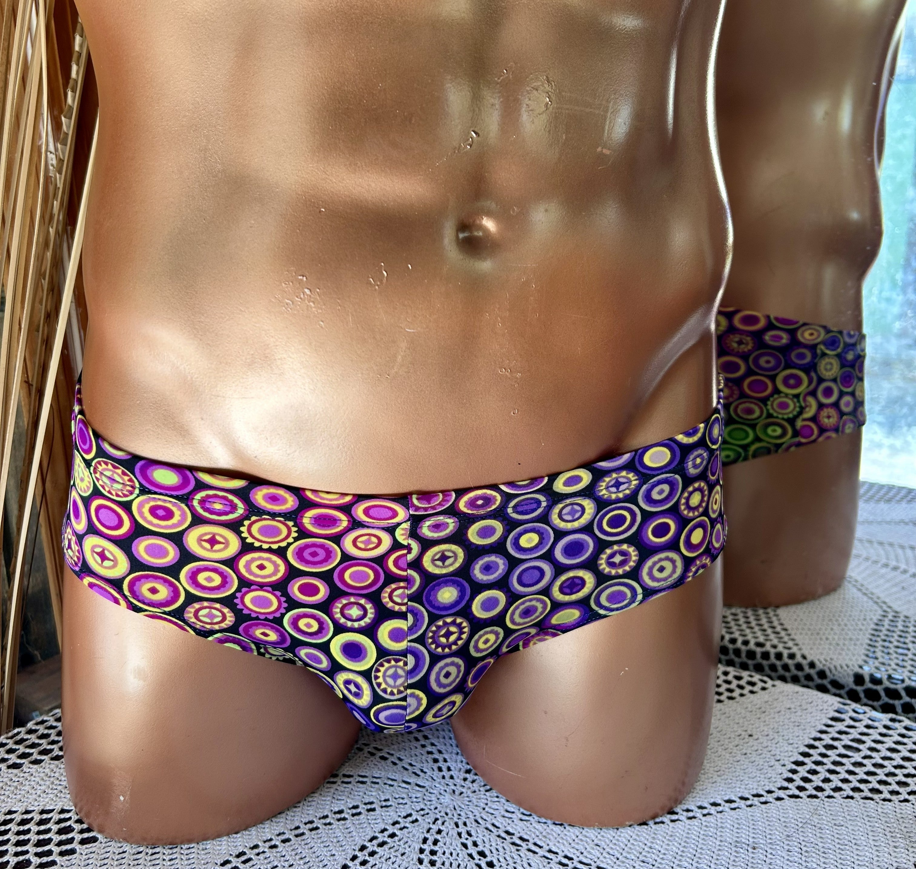 *Small Purple circles swim brief